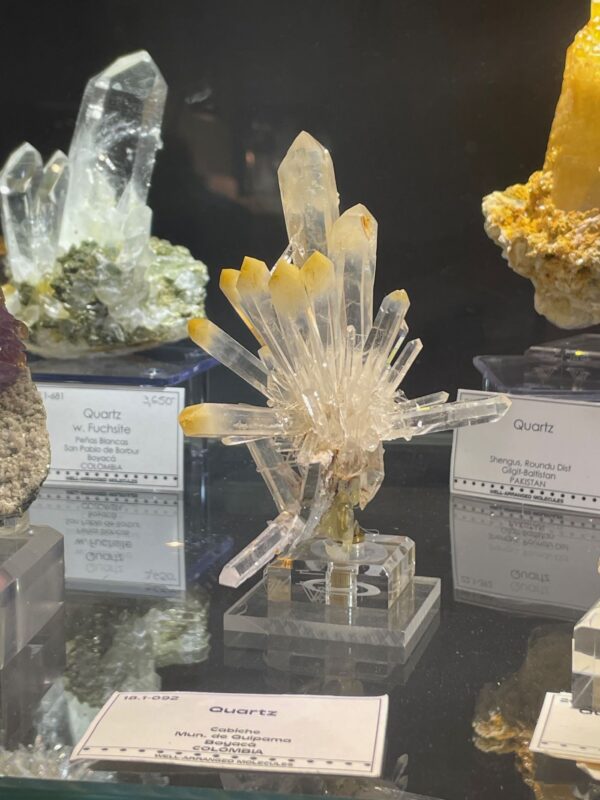 A good example of the yellow-tipped mango quartz from Columbia, Well Arranged Molecules’ room Tucson 2025 A good example of the yellow-tipped mango quartz from Columbia, Well Arranged Molecules' room Tucson 2025