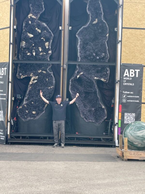 OVMC member John Biczok and 2 giant amethyst geodes at the Pueblo mineral show, Tucson 2025