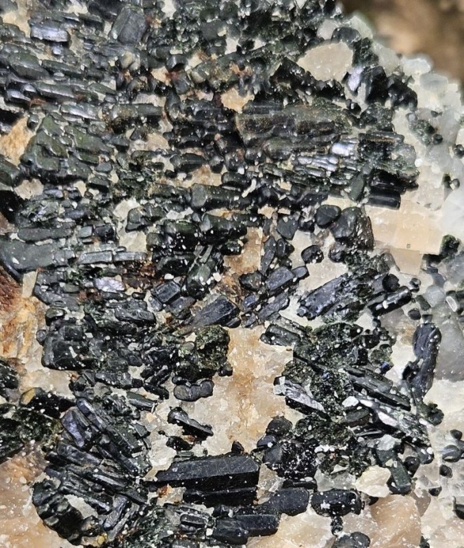 Yates Mine Diopsides on Calcite May 2025 Yates Mine Diopsides on Calcite May 2025
